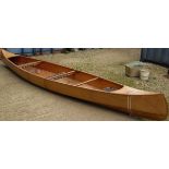 Two seater plywood canoe with oars CONDITION REPORTS Approx length 540 cm unknown