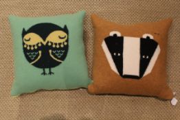 Two Donna Wilson cushions, one with green ground depicting an owl,
