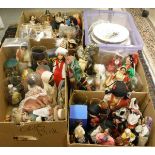 Four boxes of various costume dolls and a box of various decorative plates