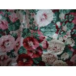 A pair of glazed cotton interlined curtains with all over floral design in a pink and green,