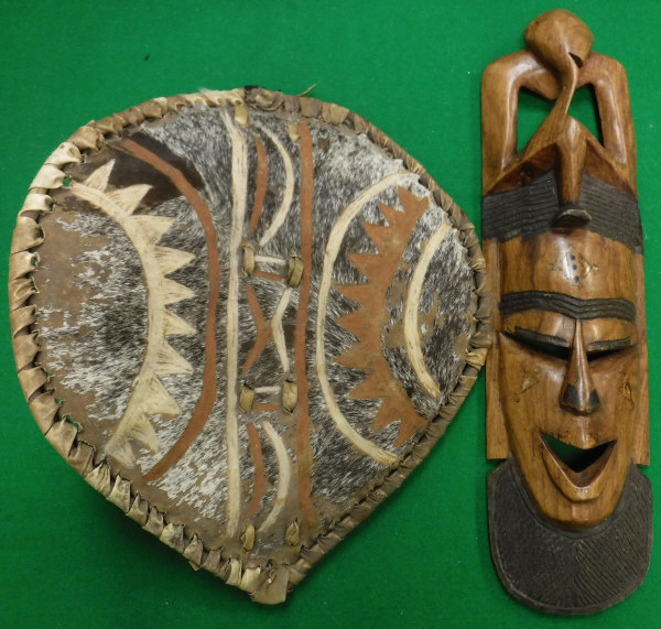 A 20th Century carved hardwood ethnic mask,