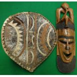 A 20th Century carved hardwood ethnic mask,