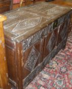 An 18th Century oak coffer of large proportions,