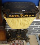 A Victorian ebonised work box with gilt decoration,