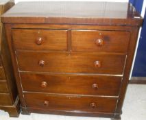 A Victorian mahogany chest of two short over three long graduated drawers to squat bracket feet