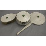 A George VI silver mounted white guilloche enamel decorated and jade bead set dressing table set