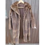 A dyed ermin full length coat CONDITION REPORTS There are several rips to the back