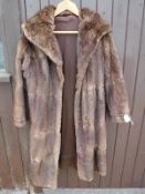 A dyed ermin full length coat CONDITION REPORTS There are several rips to the back