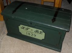 A green painted dome top pine trunk