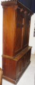 A late Victorian pitch pine cabinet in the Gothic Revival taste