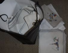 A box of assorted vintage table linens,