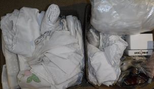 A box containing assorted table linen etc, together with a box containing various table linen,