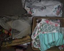 A box of assorted antique fabric remnants/off-cuts to include Ikats, needlework etc,