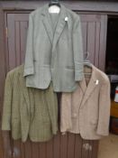 Two Gieves & Hawes tweed three piece suits together with a Magee houndstooth jacket,