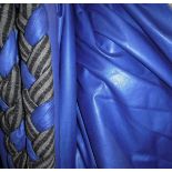 A pair of glazed cotton lined curtains of blue ground with striped black and brown edging and