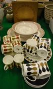 A Wedgwood Susie Cooper design "Dumbells" six place coffee set,