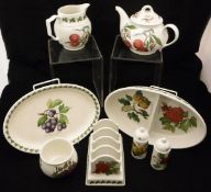 A collection of various Portmeirion Pomona tea wares including jugs, condiments, teapot, toast rack,