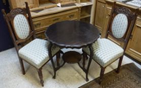 Four 19th Century mahogany framed dining chairs with carved top rails and pale blue striped