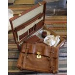 A vintage Mulberry briefcase, together with a further leather briefcase, a Pakeman,