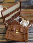 A vintage Mulberry briefcase, together with a further leather briefcase, a Pakeman,