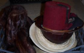 A box containing various vintage hats to include a MSA Scull Guard Type K protective hat,