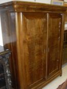 A 19th Century northern French walnut armoire,