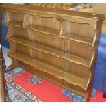 An Ercol mid elm dresser rack