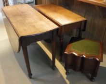 An oak drop leaf table,