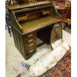 A 20th Century oak tambour fronted desk,
