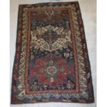 A late 19th Century Caucasian rug,