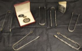 A collection of six pairs of George III silver sugar tongs with various bright cut and pierced