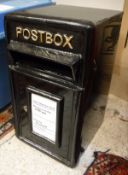 A modern cast metal black painted post box inscribed "Post Box"*