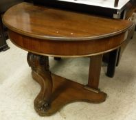 A Victorian mahogany demi lune side table on single carved cabriole front support united to the