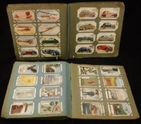 A box containing 14 various cigarette card albums to include Gallaghers, Players, Wills and Ogdens,