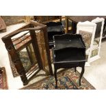 A pair of black painted bedside tables in the French manner, a brass double bed head,