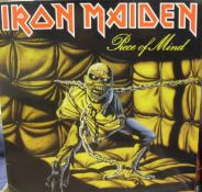 A collection of various LP records mainly rock including Iron Maiden "Iron Maiden", "Peace of Mind",