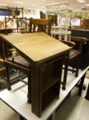 A 20th Century oak lectern of small proportions, two oak framed side chairs,