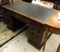 A Victorian mahogany pedestal desk with green leather inset top over nine assorted drawers,