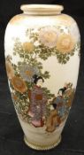 A Japanese Meiji period satsuma ware vase decorated with figures amongst flowers bearing gilt and