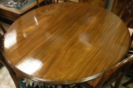 A 19th Century mahogany oval breakfast table,