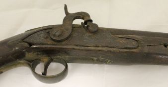 A 19th Century hammer action pistol,