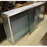 A pair of modern SDS steel and glass display cabinets with sliding lockable doors