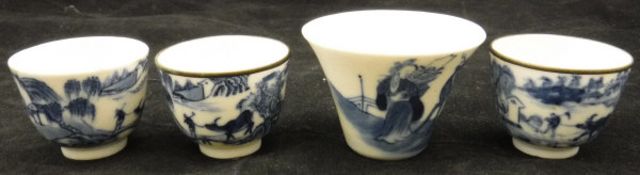 Four various Chinese tea bowls including one of conical form decorated with a stag and two maidens
