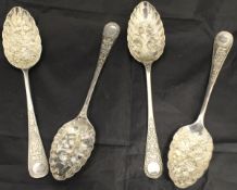 Two pairs of Victorian embossed silver fruit spoons (by Walker & Hall,