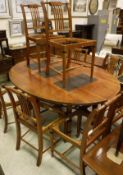A modern mahogany dining suite by Freeborn of York,