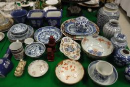 A collection of various Oriental porcelain to include Chinese blue and white dishes and plates