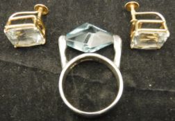 A mid 20th Century silver dress ring set with pale blue stone (bears hallmark CBS in three circular