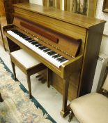 A modern mahogany cased upright piano, the iron framed overstrung movement by Kemble of London,
