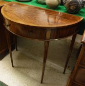 An Edwardian rosewood and cross-banded demi-lune side table with single drawer on square tapered