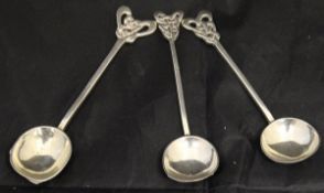 A set of three George V silver coffee spoons with Celtic knot finials (by Ellen Caroline Woodward,